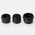 The three black Tazzi adapters side by side: ground coffee, Nespresso Original capsule base and Dolce Gusto capsule adapter